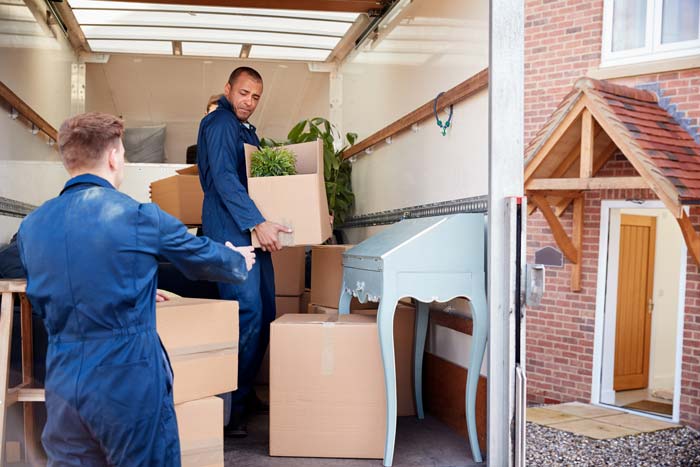 Movers Unloading Furniture — Billings, MT — Aaron's Back Company Movers Unloading Furniture — Billings, MT — Aaron's Back Company
