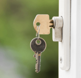 a set of keys in a uPVC lock