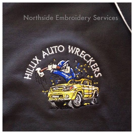 Embroidery done on work wear cloth