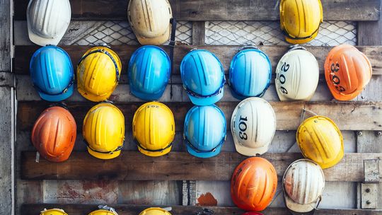 constructor-helmets-hanging