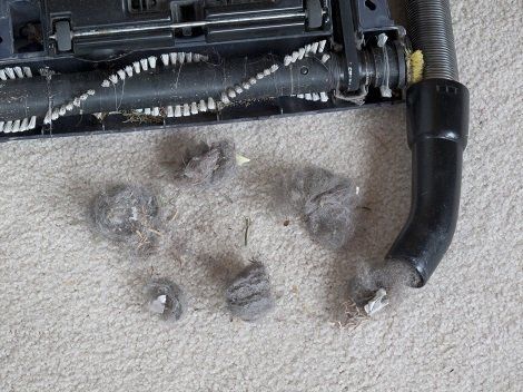 Repairman Fixing Vacuum Cleaner — Bellflower, CA — A-Rodgers Vacuum & Sewing