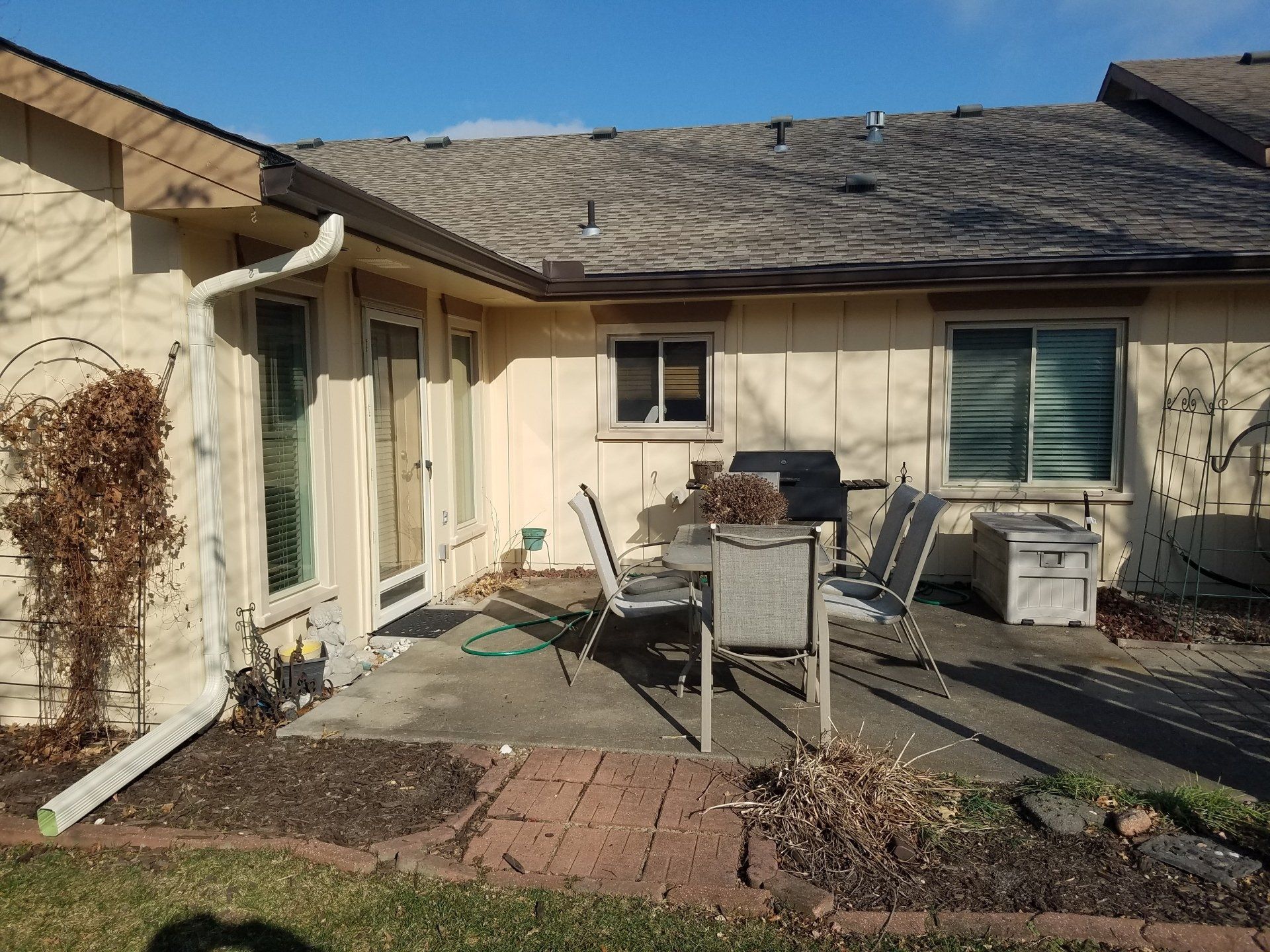 Gray roof shingles gutter — Raymore, MO — Meissen & Sons Roofing Gray roof shingles gutter — Raymore, MO — Meissen & Sons Roofing