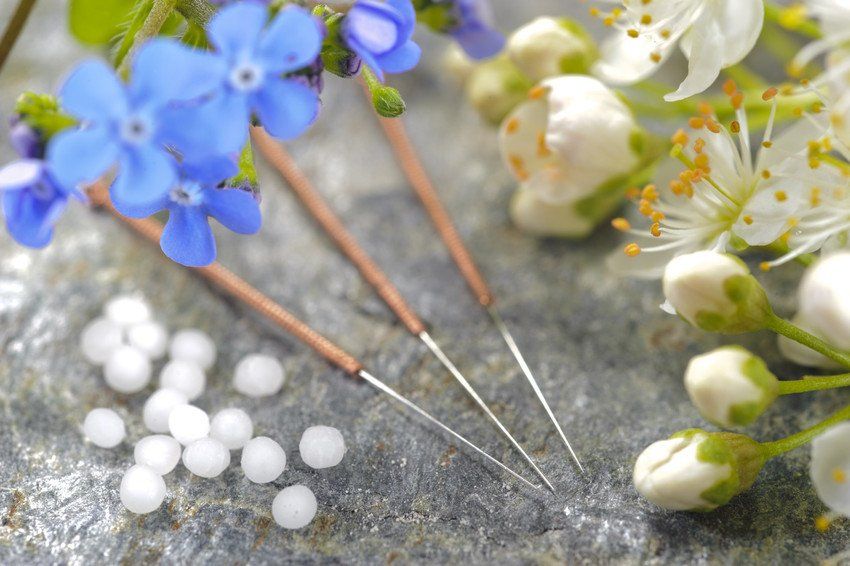 Alternative medicine with herbal pills and acupuncture