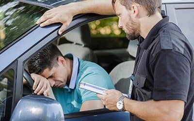 Man in Car and An Enforcer — Traffic Tickets in Leawood, KS