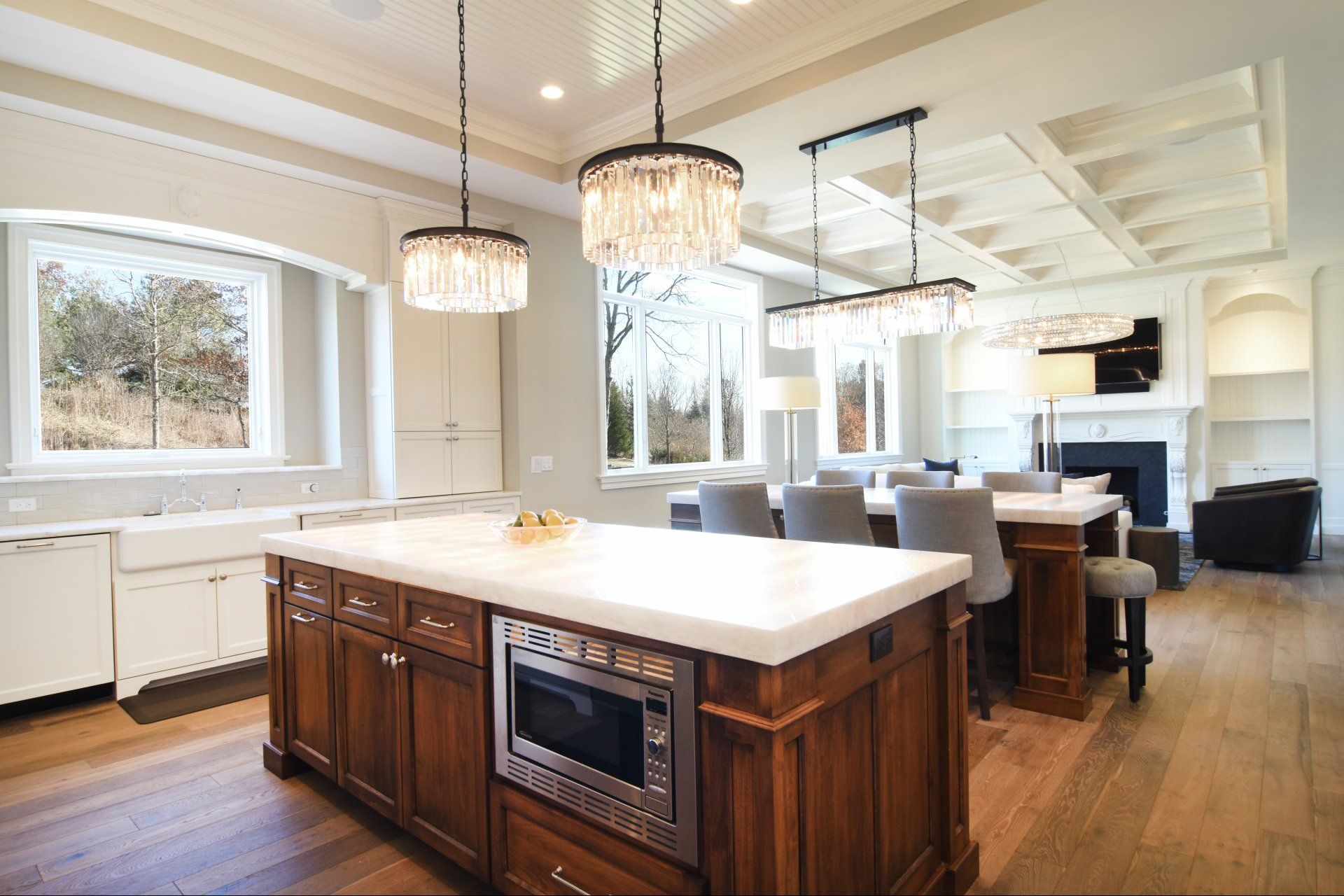 There is a large island in the middle of the kitchen.