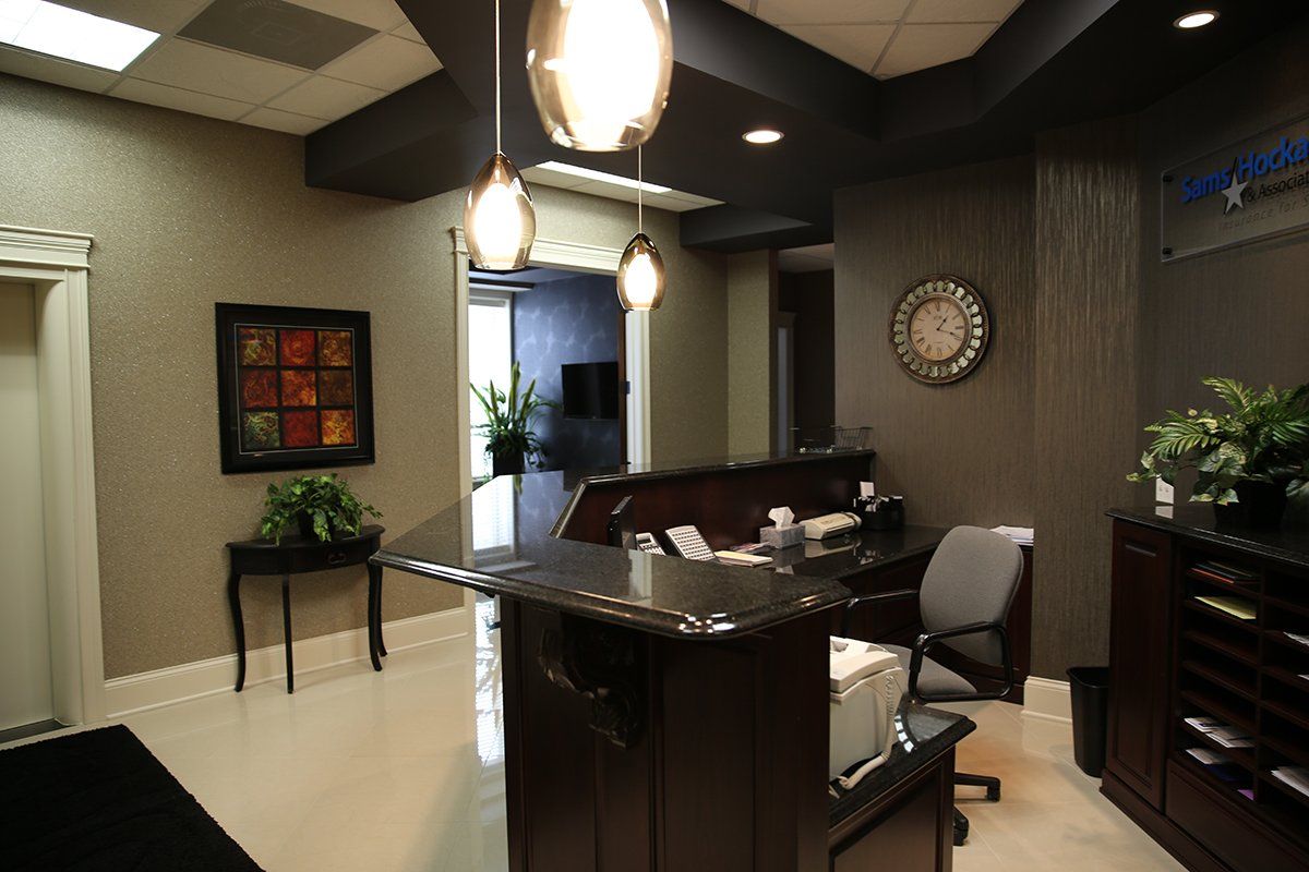A reception area with a clock on the wall