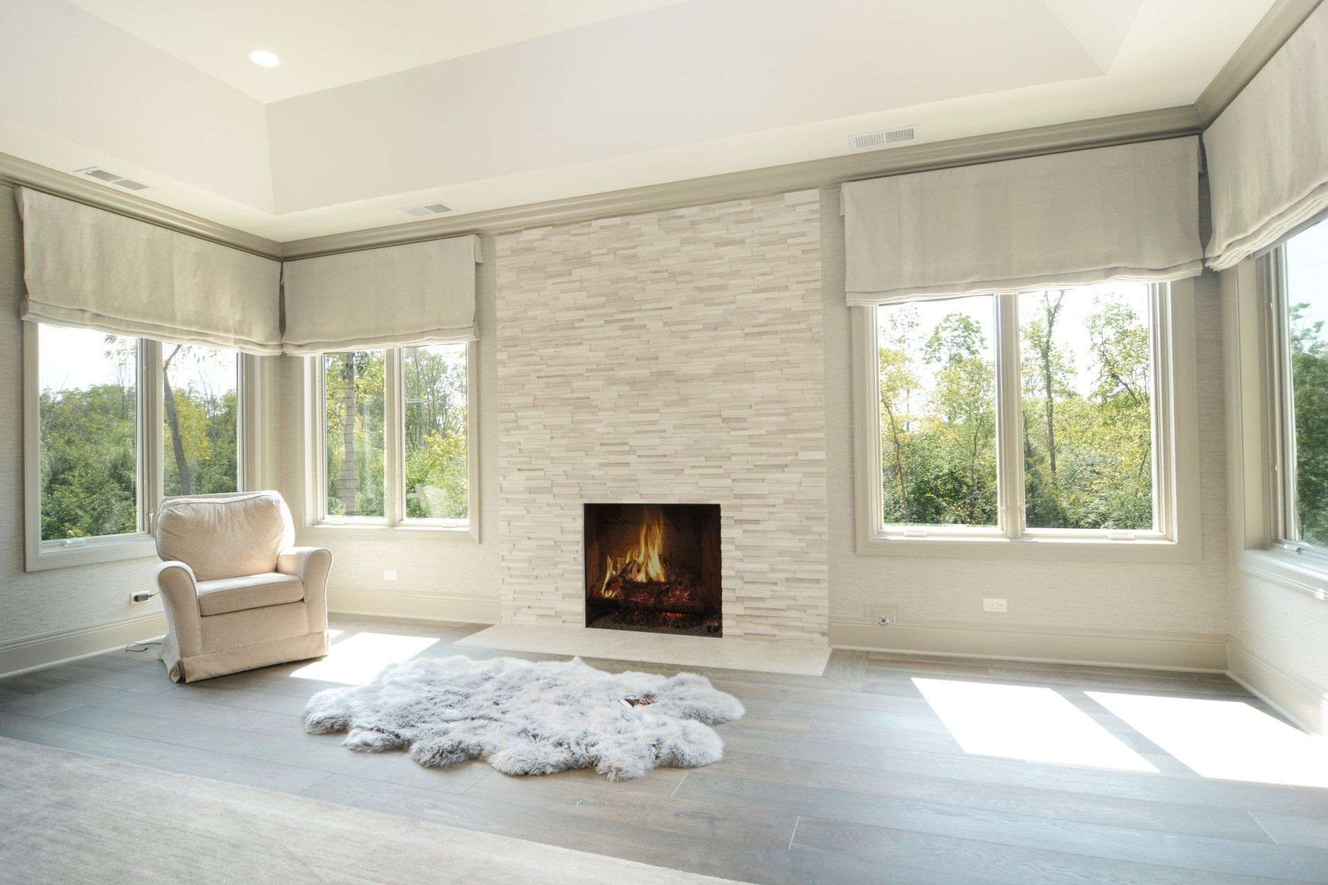 There is a fireplace in the middle of the room.