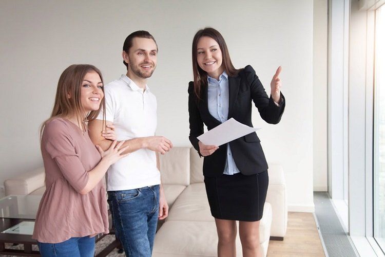 Agent Assisting Couple on Apartment Inspection — Carpentersville IL — Meadowdale Apartments Agent Assisting Couple on Apartment Inspection — Carpentersville IL — Meadowdale Apartments
