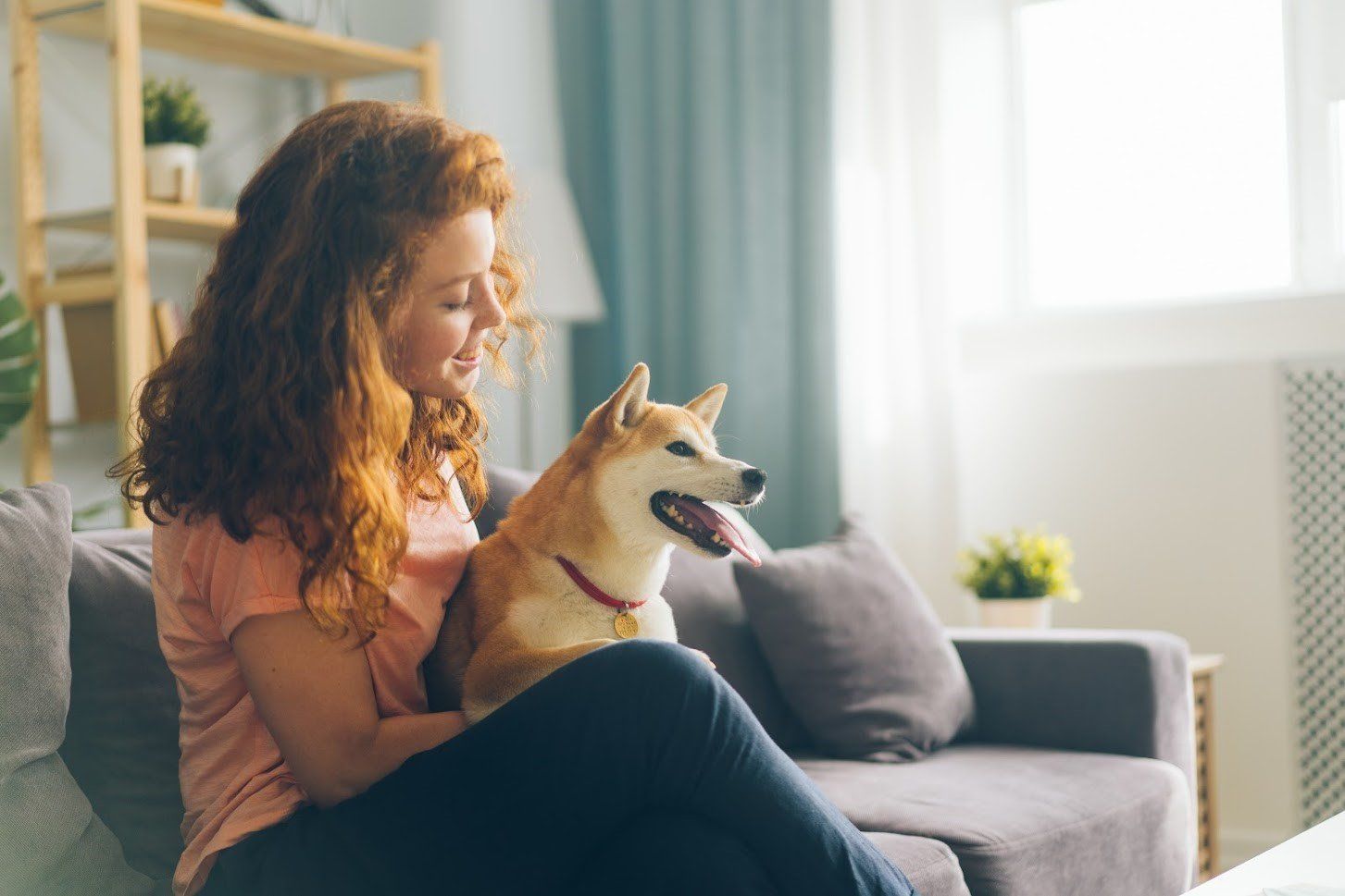 Woman With Her Dog — Carpentersville, IL — Meadowdale Apartments Woman With Her Dog — Carpentersville, IL — Meadowdale Apartments