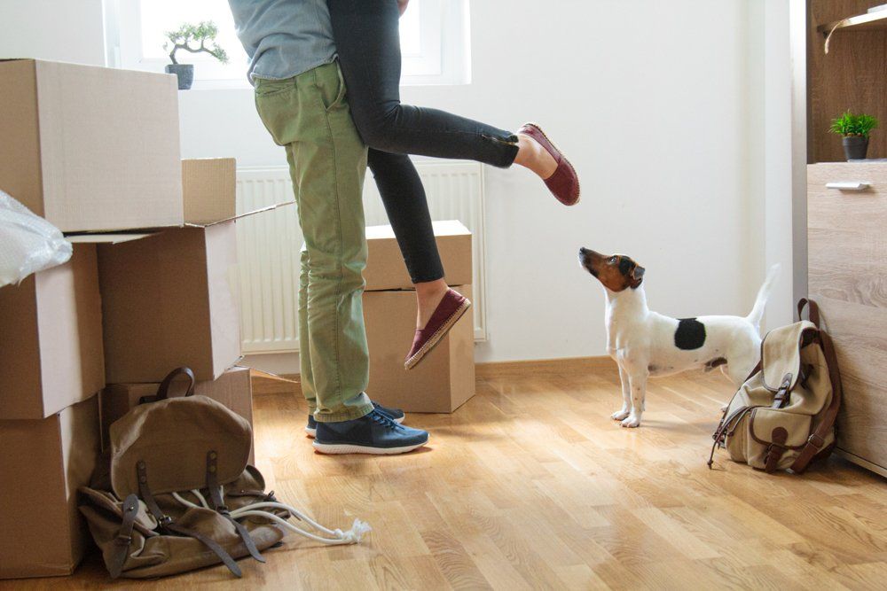 happy couple moving