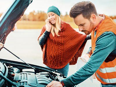 Roadside Assistance — Man Helping Woman with Her Car in  North Chesterfield, VA