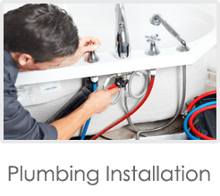 Man Plumbing Installation — Plumbing Repair in Horse Prairie, RD