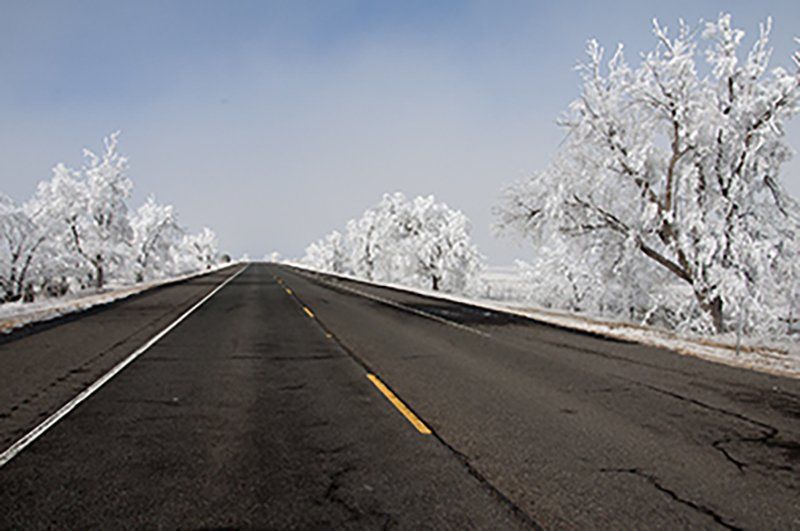Hoarfrost turns both sides of a highway into a West Texas winter scene.