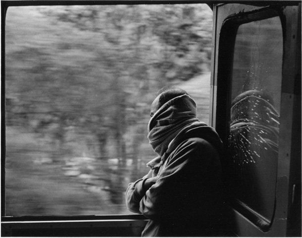 a documentary photo of a man on the Pacifico al Chihuahua train near Copper Canyon, Mexico.