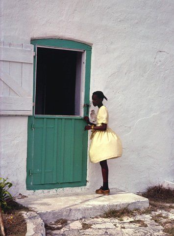 photo of girl wearing a puffy yellow dress