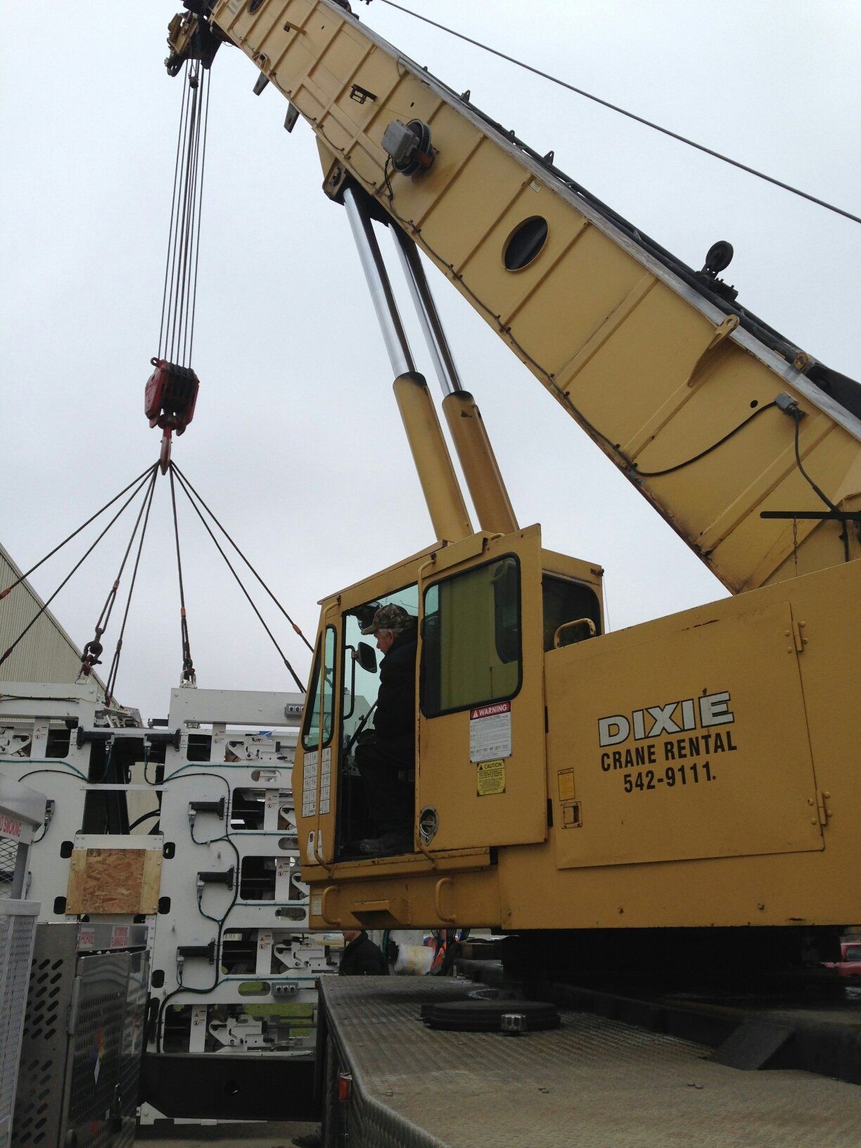 Crane operators working in a construction area in Cincinnati, OH.