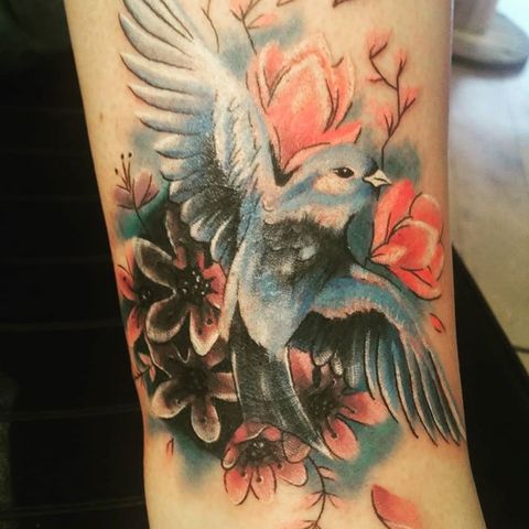 Butterfly on a flower tattoo