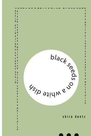 Shira Dentz black seeds on a white dish