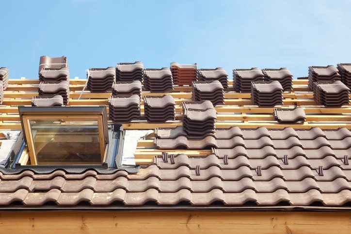 Residential Roof Inspections — Roofing Tiles with Open Skylight in Napa, CA