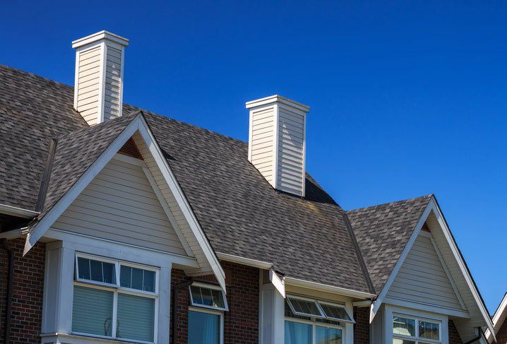 Gutter Installation — Modern House with Asphalt Roof in Napa, CA
