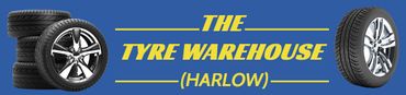 The TYRE WAREHOUSE logo
