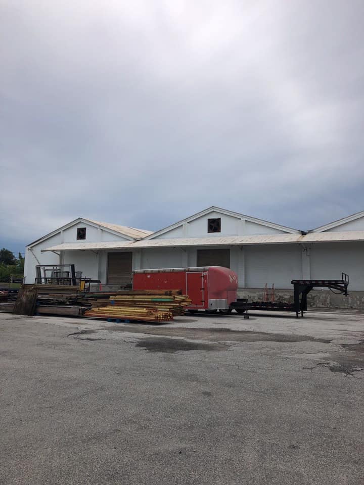 Commercial warehouse roof replacement before wesley chapel