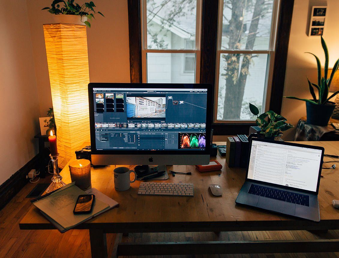 Close up image of Arri Alexa A desk with a computer and a laptop on it