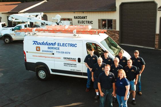 Electricians Around Truck — Shawano, WI — Raddant Electric Service Inc Electricians Around Truck — Shawano, WI — Raddant Electric Service Inc
