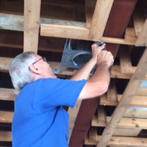 Electrician Installing Light Box — Shawano, WI — Raddant Electric Service Inc
