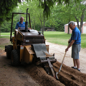Digging Hole — Shawano, WI — Raddant Electric Service Inc