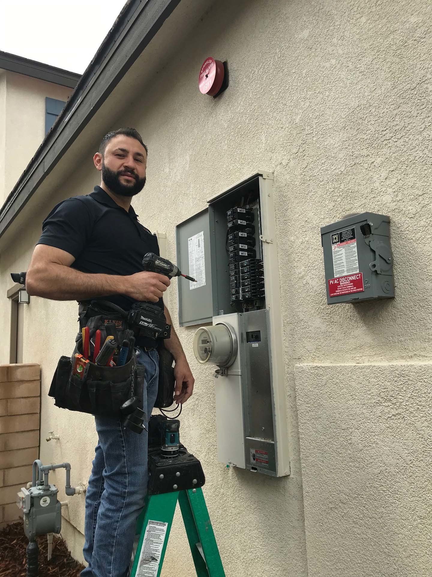 Electrician Fixing a Breaker Box — Riverside, CA — Volt Tech Electric