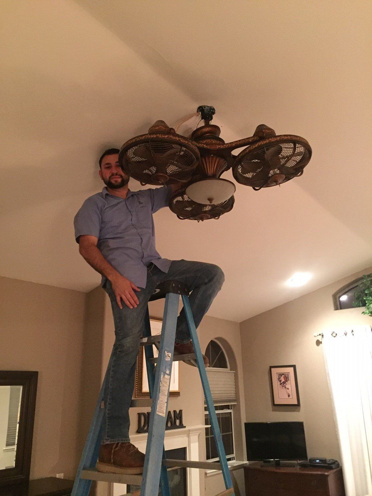Electrician Fixing a Ceiling Fan — Riverside, CA — Volt Tech Electric