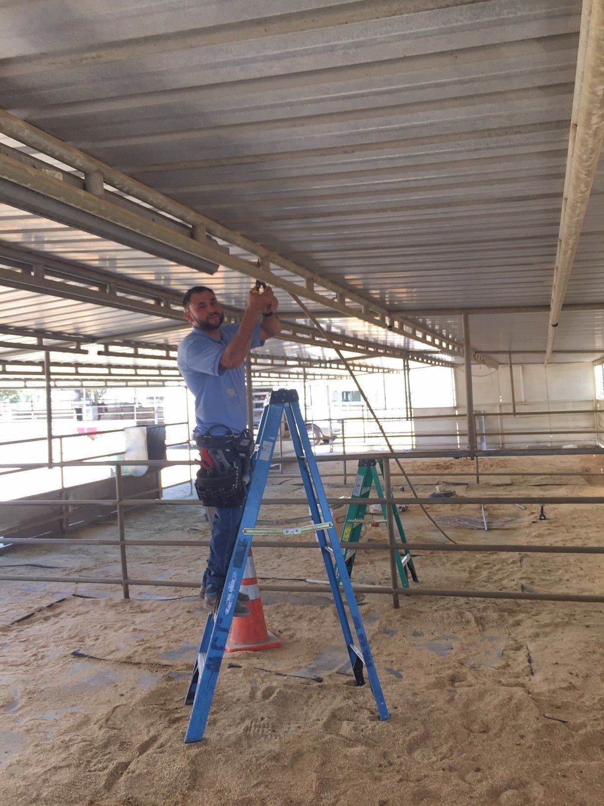 Electrician Fixing a Wire — Riverside, CA — Volt Tech Electric