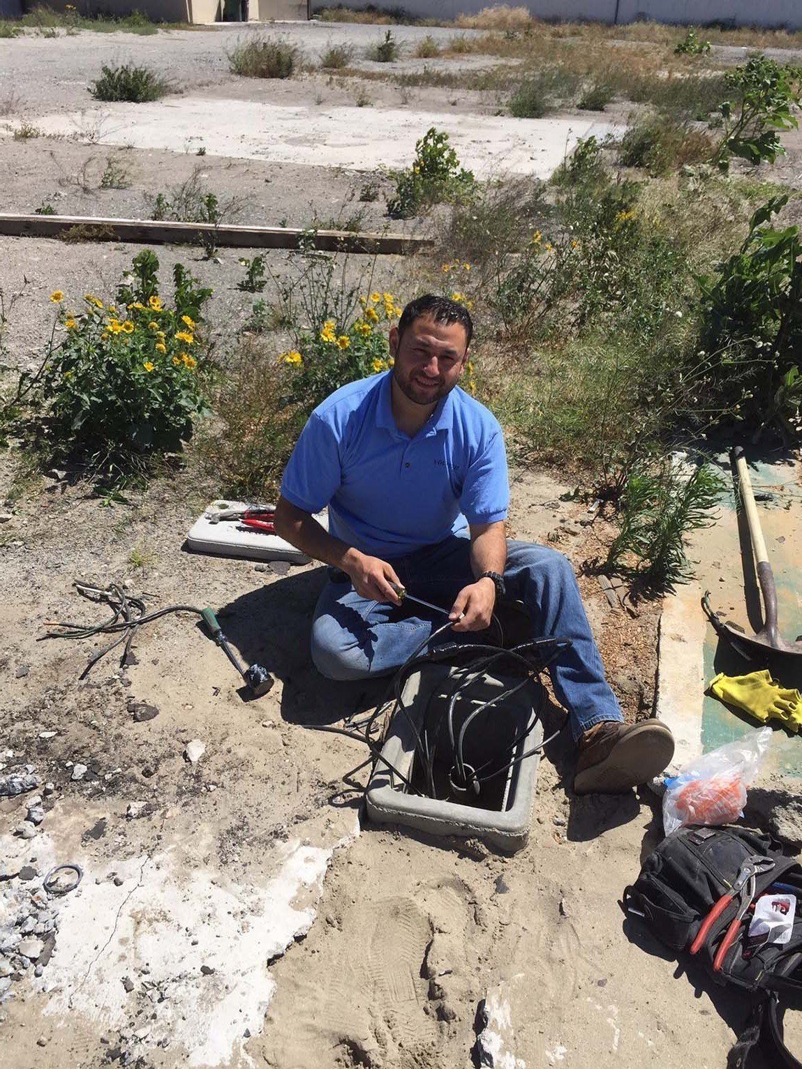 Electrician Repairing Electrical Wiring — Riverside, CA — Volt Tech Electric