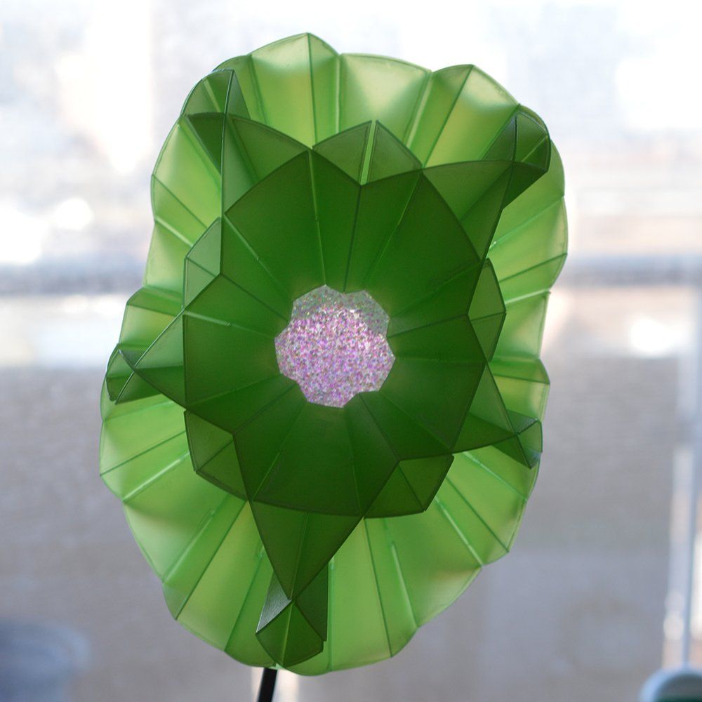 Sophia Construct as The Brighton Flower, on a Solar Powered Garden Light.Green 0.8mm Transparent Polypropylene Sophia Construct as The Brighton Flower, on a Solar Powered Garden Light Green 0.8mm Transparent Polypropylene