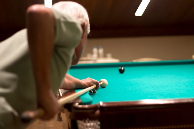 Senior Man Playing Snooker — Greenville, MI — Billiard Recovery Service Senior Man Playing Snooker — Greenville, MI — Billiard Recovery Service