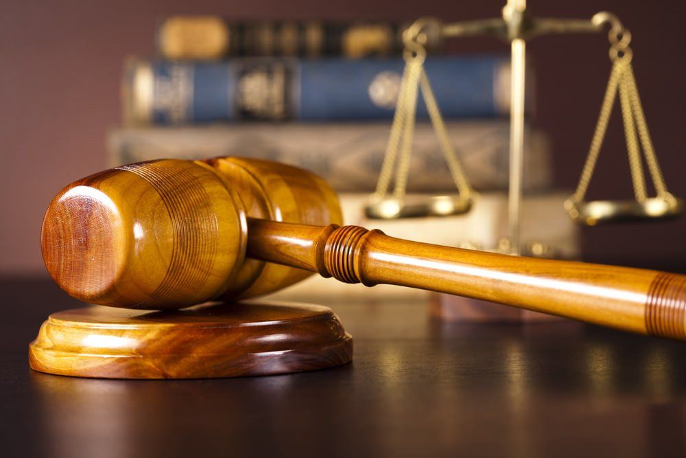 wooden gavel lying on the table