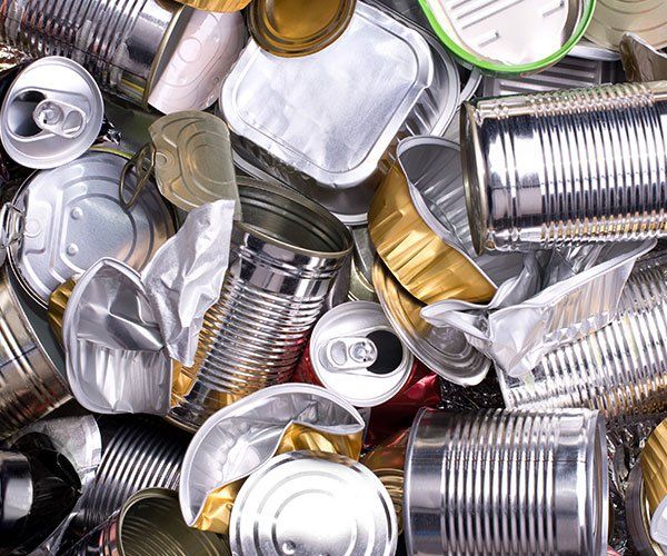 Tin Cans — Storm Lake, IA — Garbage Hauling Service Inc Tin Cans — Storm Lake, IA — Garbage Hauling Service Inc