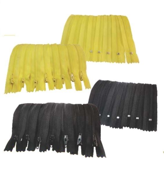 Three pleated fringed fabric pieces in yellow and black on a white background