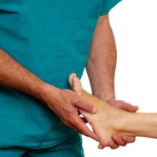 podiatrist examining foot