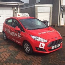 red hatchback car