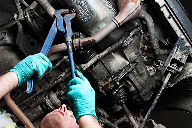 Mechanical Repairs A Car In The Garage — Woolcock Automotive In Townsville QLD Mechanical Repairs A Car In The Garage — Woolcock Automotive In Townsville QLD