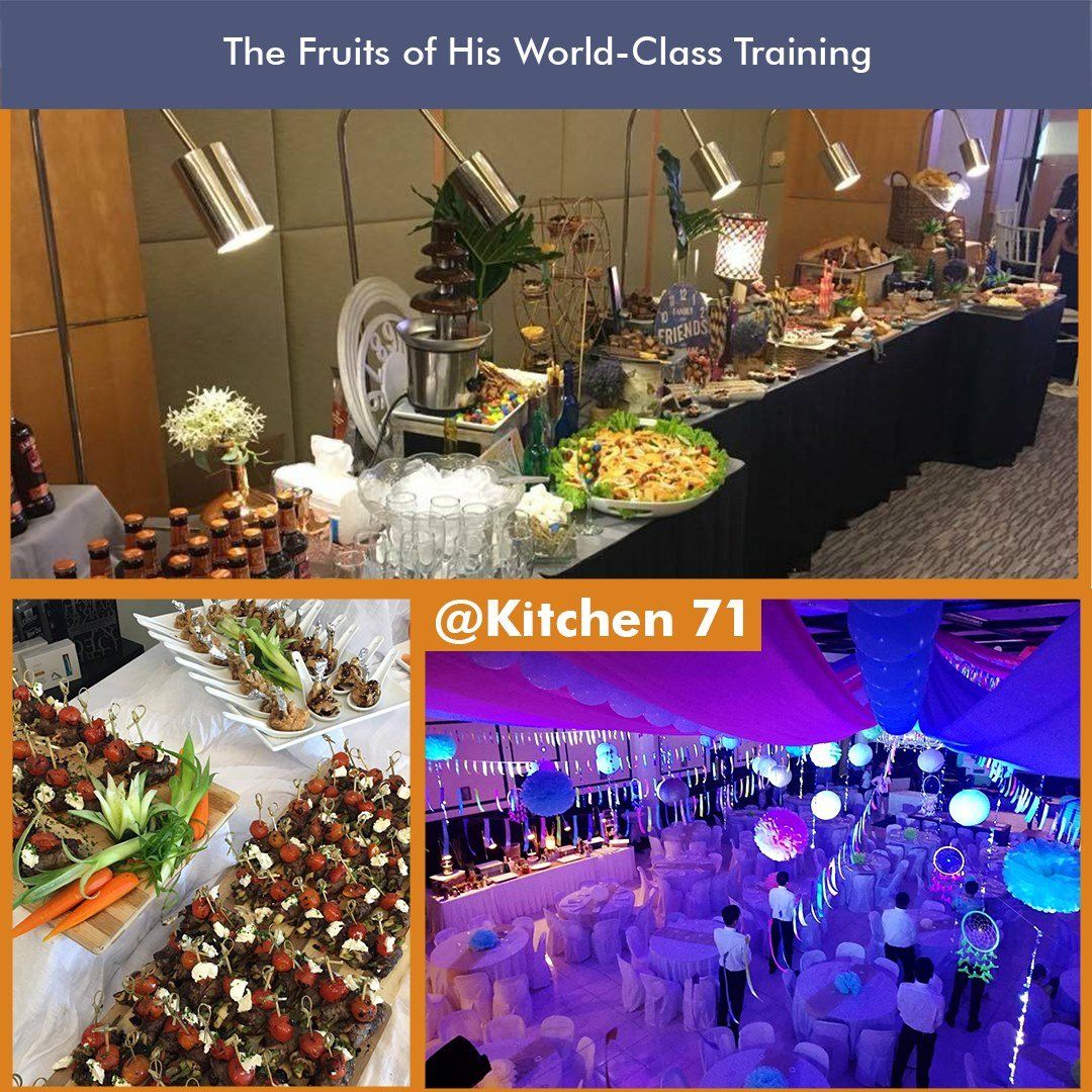 Buffet banquet display with colorful food, floral decor, and a purple-lit event hall; “@Kitchen 71” text visible