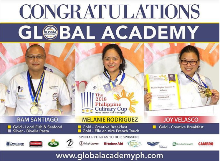 Three medal-winning students at Global Academy hold certificates under a “Congratulations” banner.