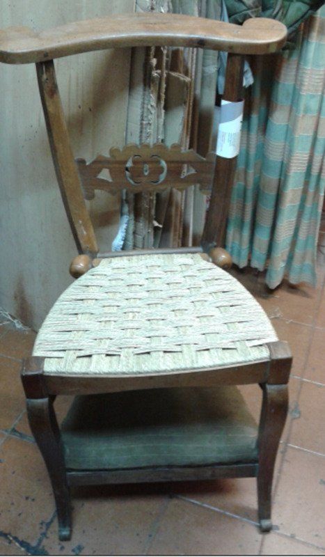 wooden chair with woven seat