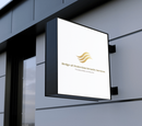 Outdoor sign for Bridge of Innovation Software School on a gray building wall