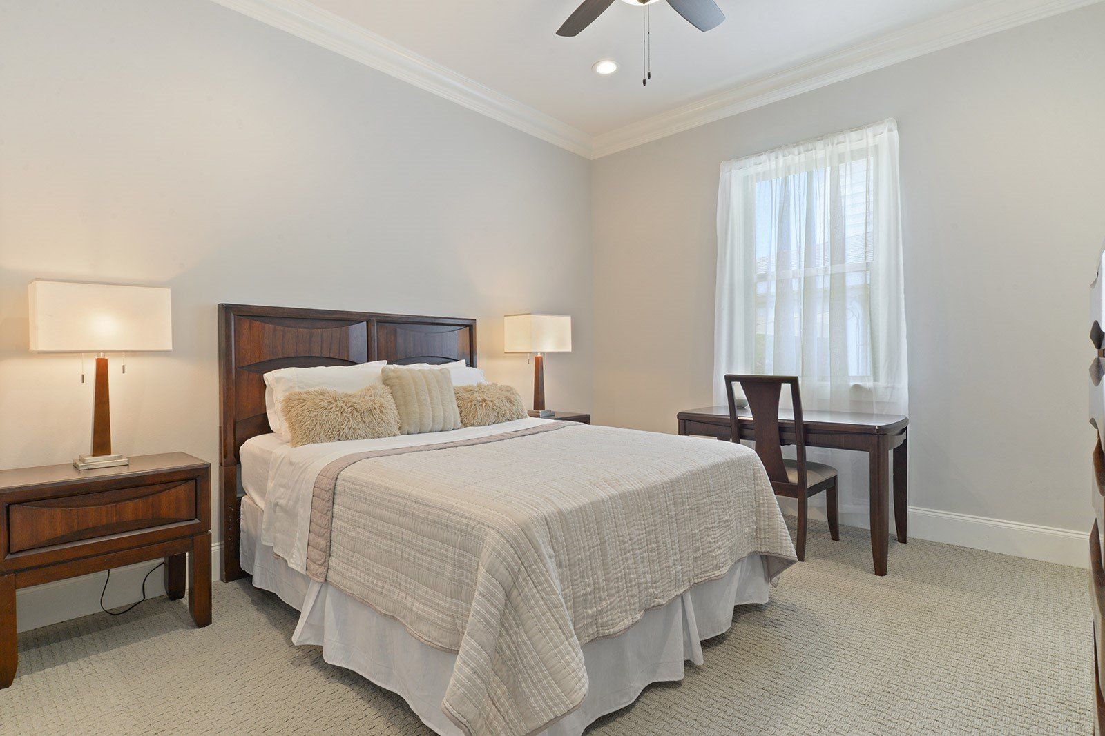 Bedroom with white bed
