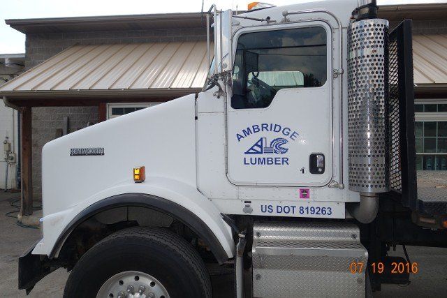Above Ground Pool Decks — Company Truck with Logo in Ambridge, PA