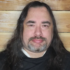 Darrell J. Delph, is a 2nd degree High Priest in the WISE Tradition and the High Priest of The Ever Green Hearth.