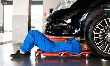 Car repair in progress in Glasgow